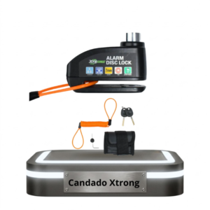 Candado Xtrong con alarma integrada para disco, acompañado de cable recordatorio naranja, llaves y funda negra.